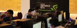Gamers engaged in a gaming contest at NVIDIA  BYOC 2013